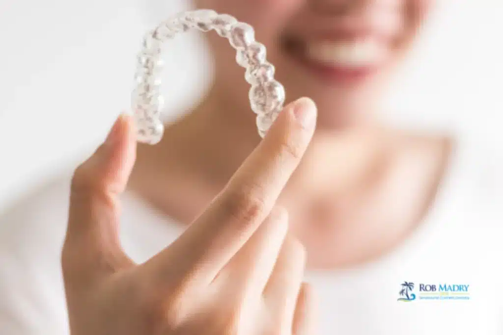 Adult Invisalign treatment with clear aligners for a straighter smile
